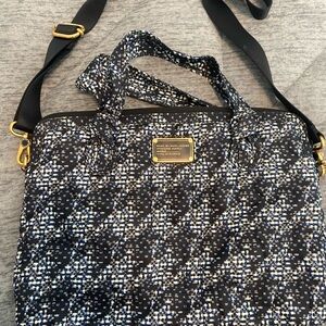 Blue, black, and white Marc Jacobs laptop case